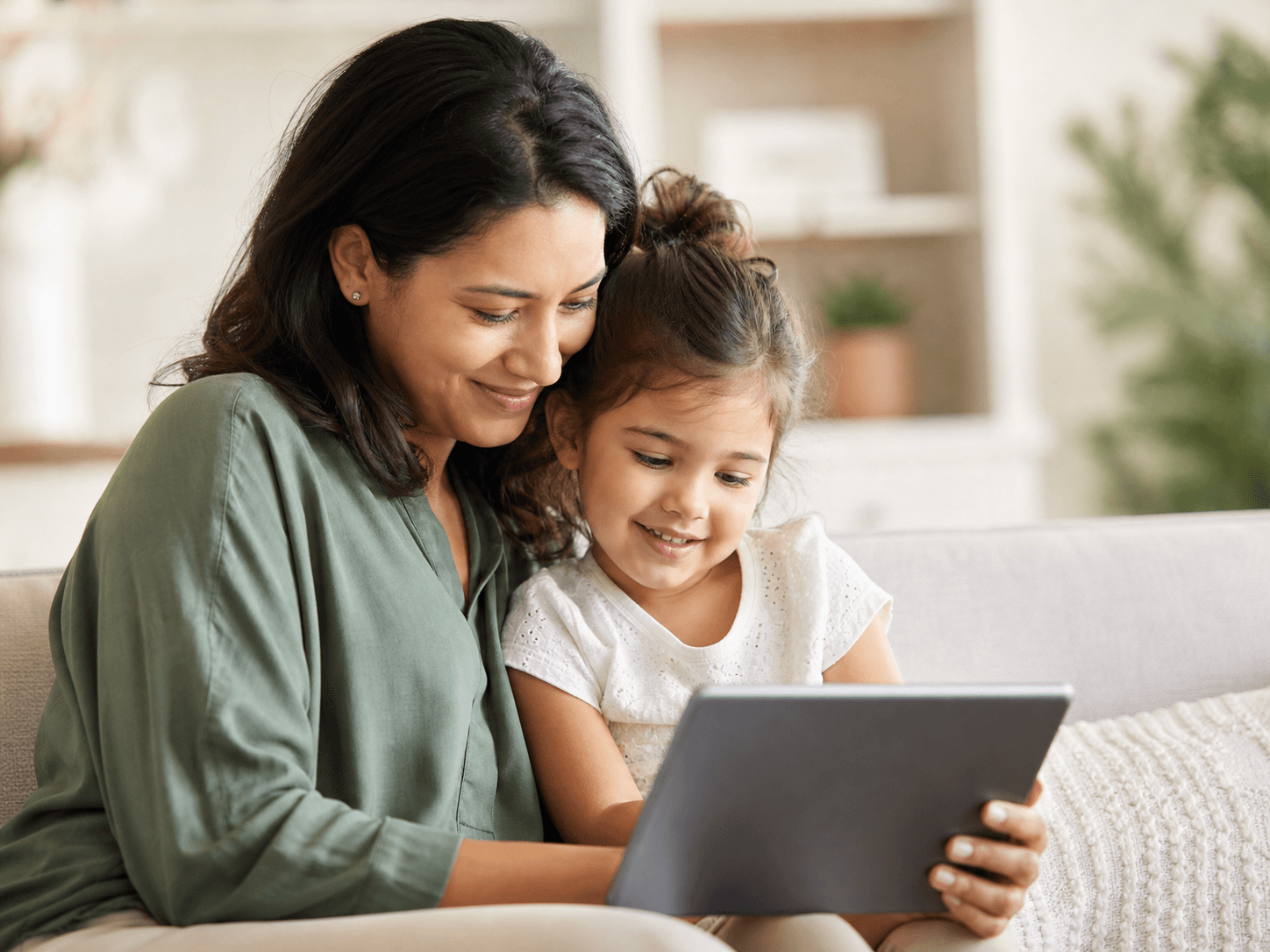 Caregiver holding a child in a warm moment of connection